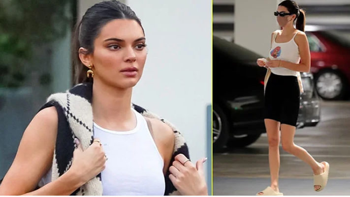 Kendall Jenner puts her fit physique on display in tinny outfit